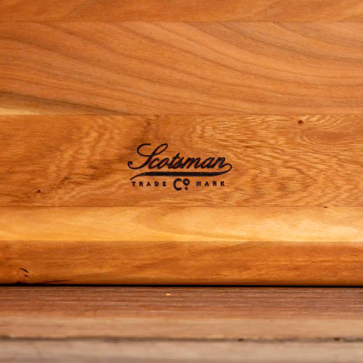 Cherry Barbecue Board with handles. Close up of Scotsman logo.