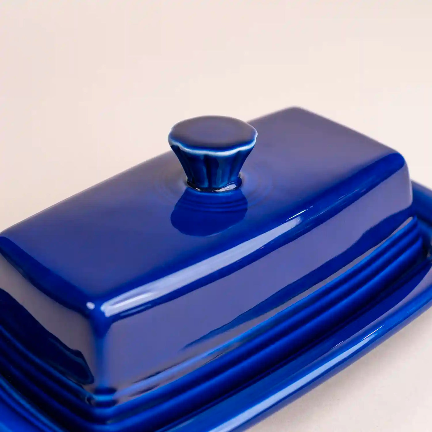 Fiesta ware twilight blue covered butter dish.