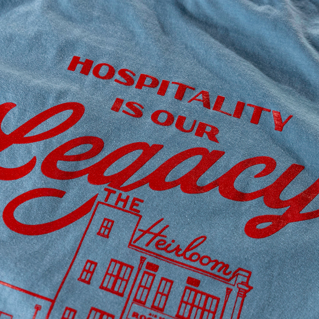 Hospitality is Our Legacy Pale Blue T-Shirt