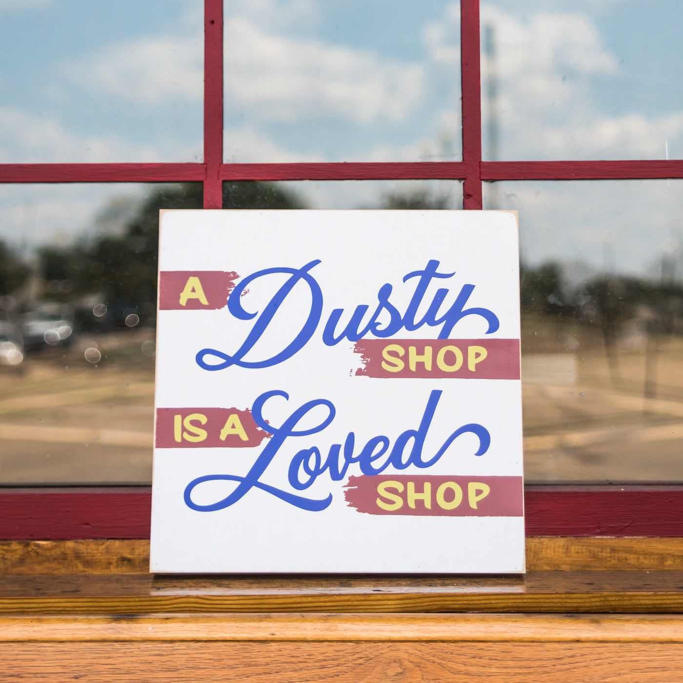 Dusty Shop Sign